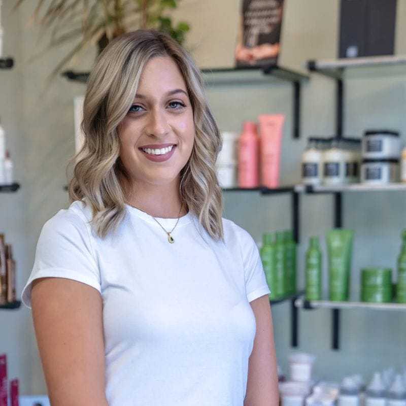 Portrait of Elizabeth, a professional stylist at Salon Sublime, showcasing their expertise and style.